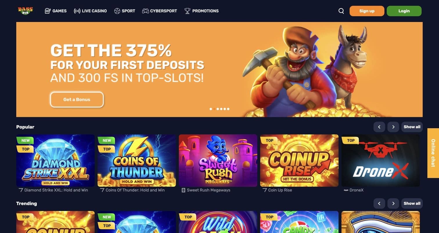 Basswin casino homepage with a welcome-offer banner and rows of popular and trending games